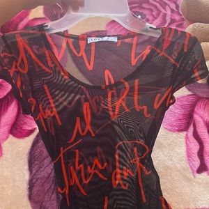 Body con see-through jumpsuit.